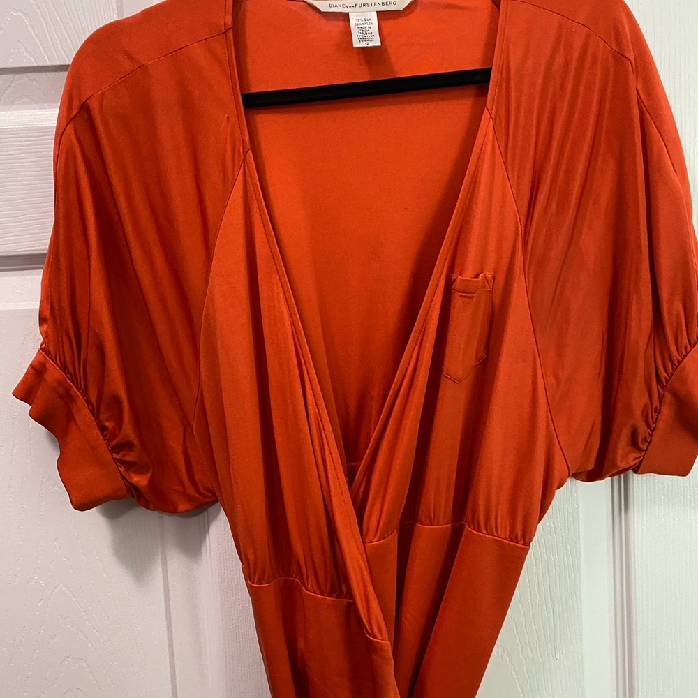 DVF orange wrap dress perfect for summer and fall.
